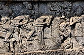 Candi Panataran - Main Temple. Krishnayana reliefs. The spoils of victory, female captives from Yawana. 